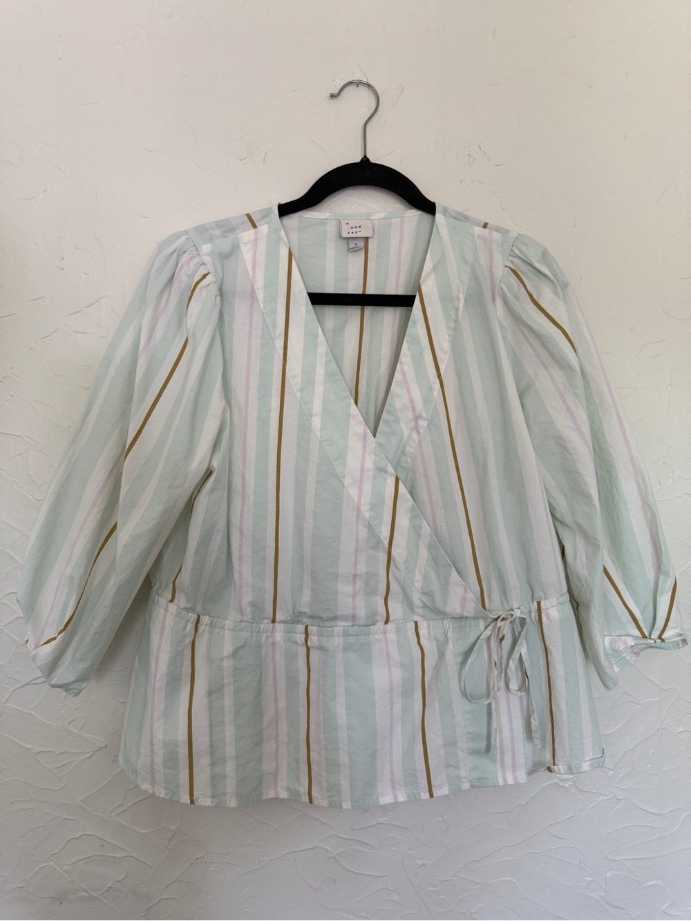 A new day stripped blouse. Size Large